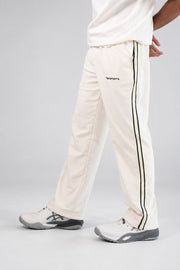 BYSPORTS Premium Side-Stripe Trouser For Men & Women – Cream, side view on model | BYSPORTS