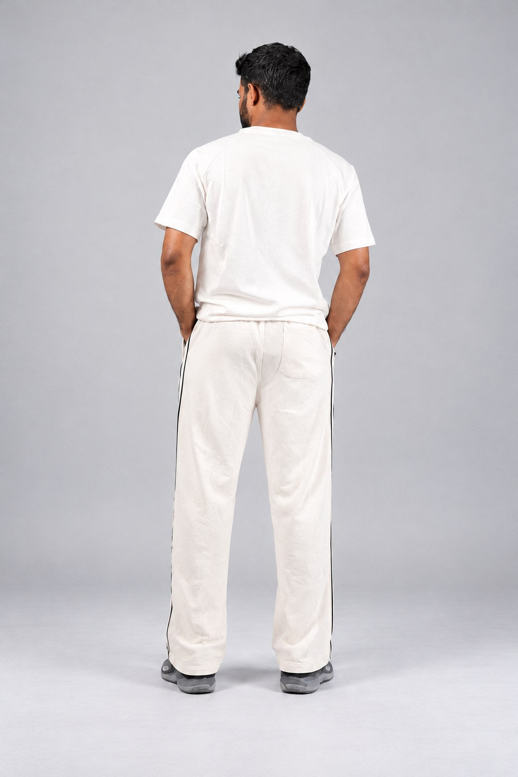 BYSPORTS Premium Side-Stripe Trouser For Men & Women – Cream, worn by model | BYSPORTS