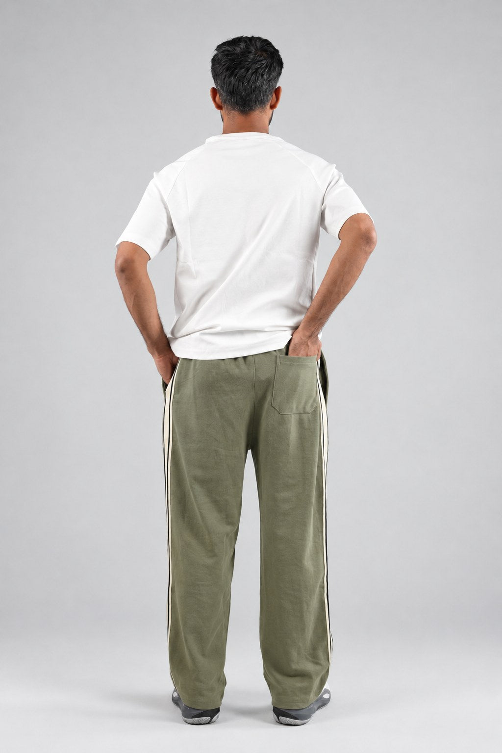 BYSPORTS Premium Side-Stripe Trouser For Men & Women – Olive, worn by model 2 | BYSPORTS