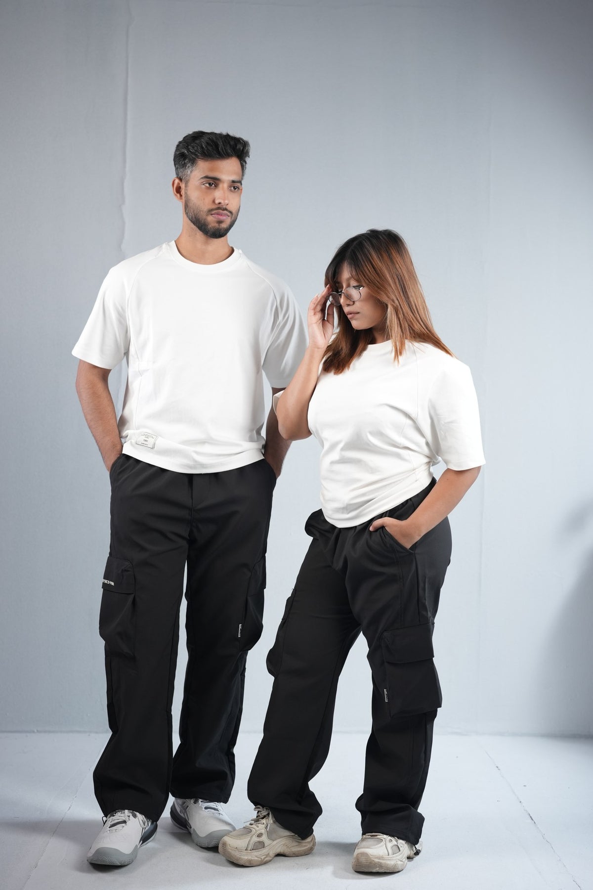 Premium Cargo Pant For Men & Women – Black, worn by male and female models | BYSPORTS