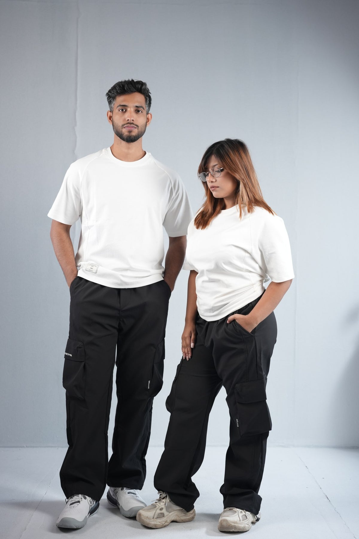 Premium Cargo Pant For Men & Women – Black, worn by male and female models 2 | BYSPORTS