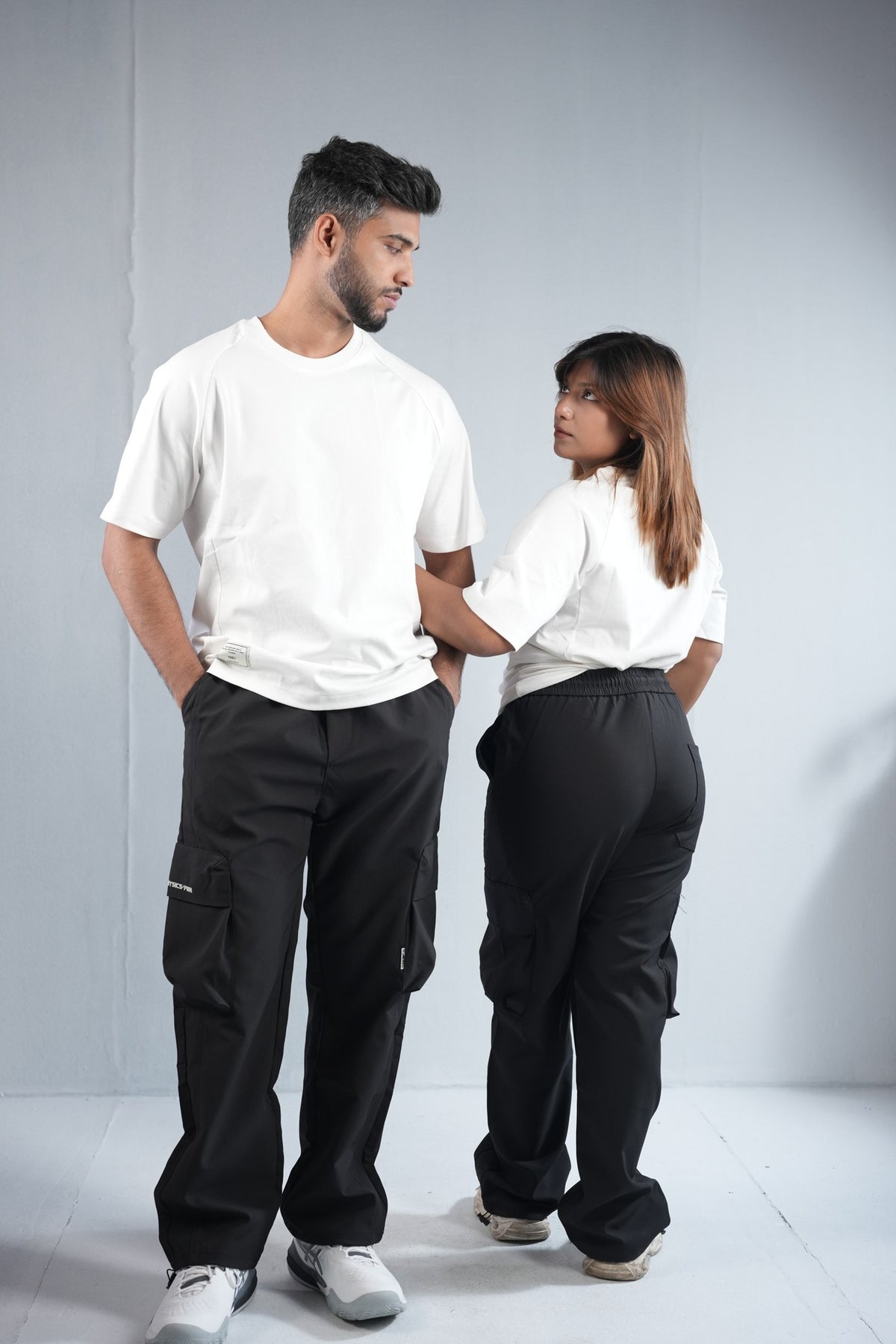 Premium Cargo Pant For Men & Women – Black, worn by male and female models 4 | BYSPORTS