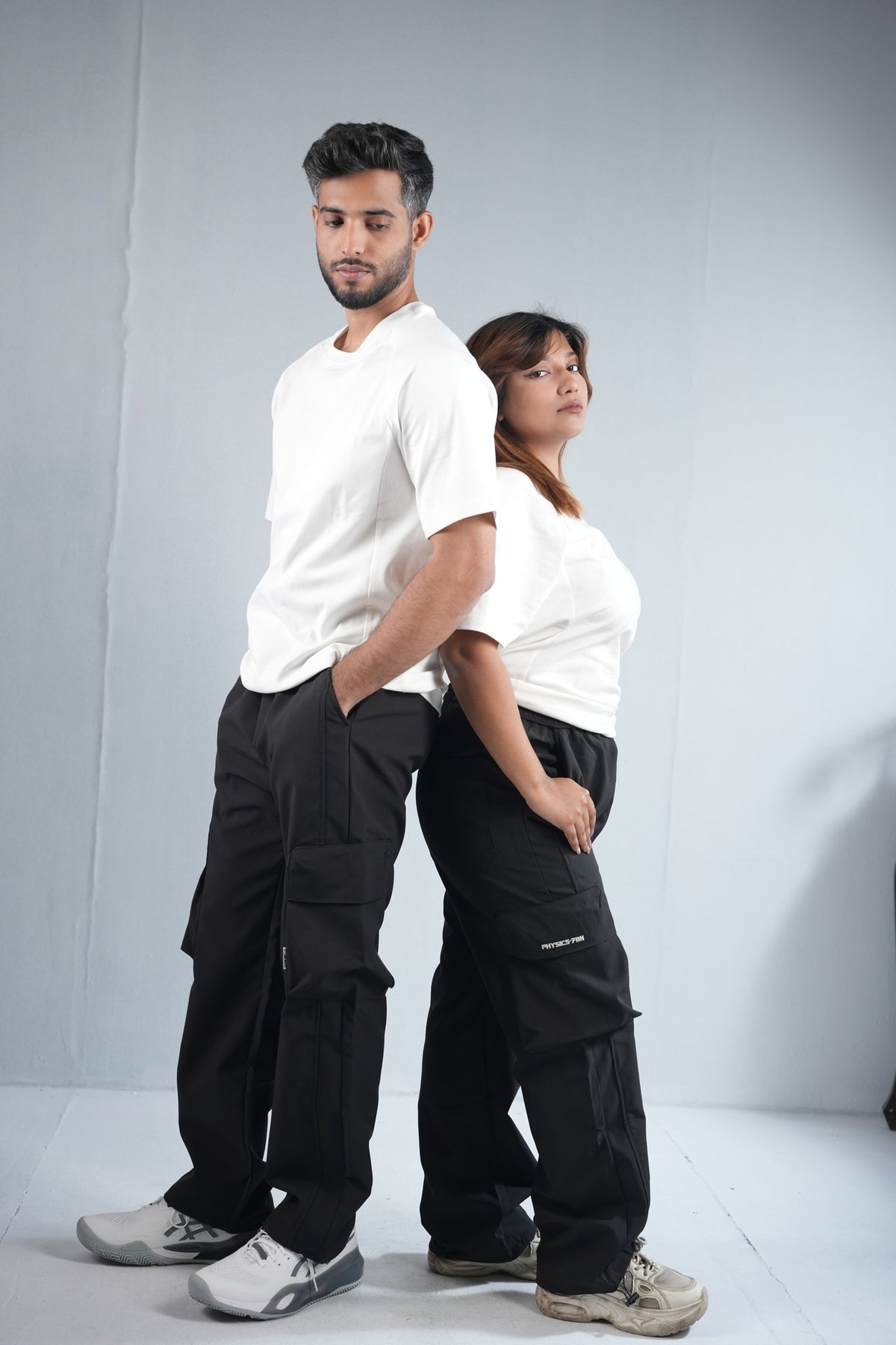 Premium Cargo Pant For Men & Women – Black, worn by male and female models 7 | BYSPORTS