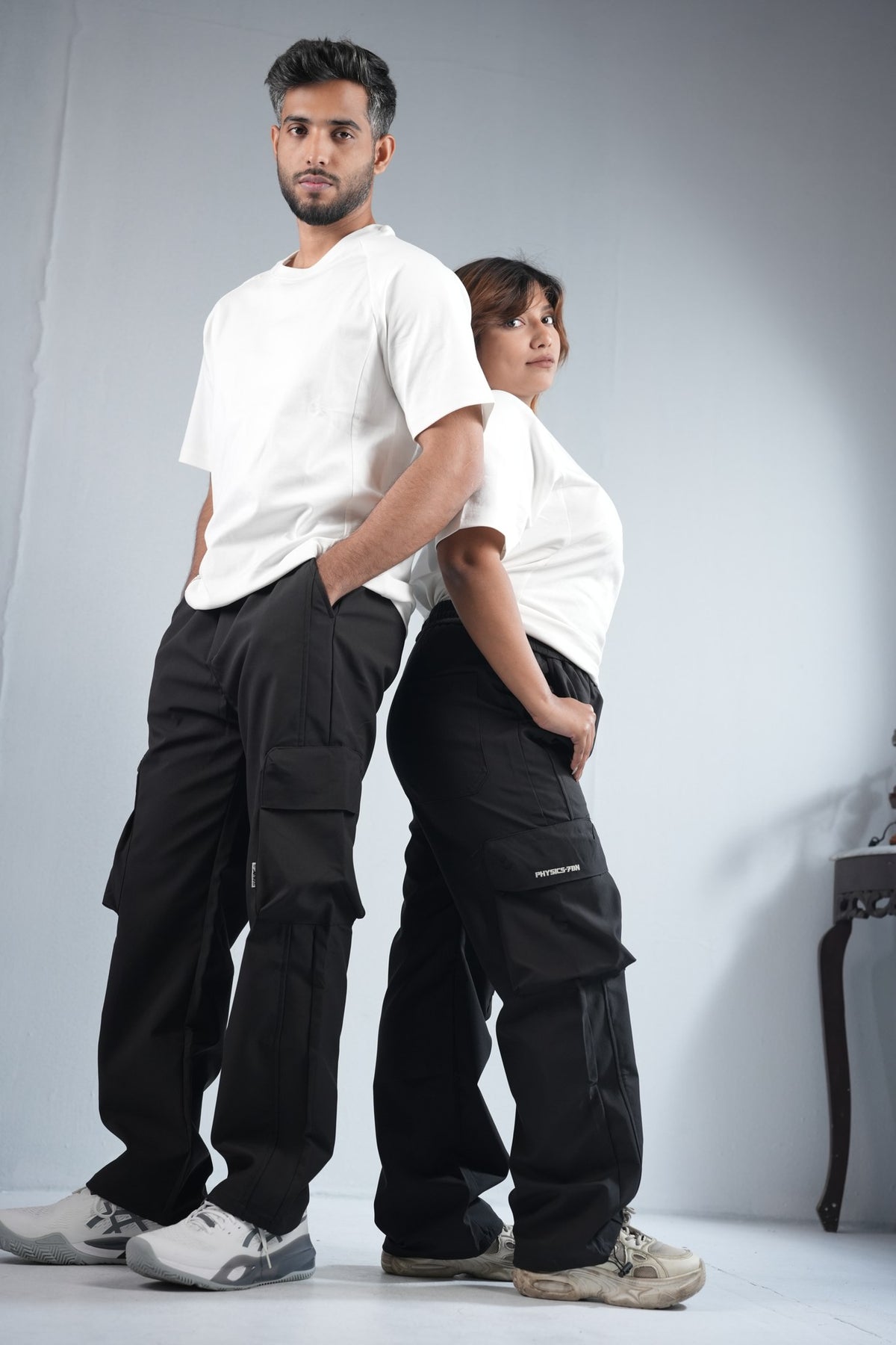 Premium Cargo Pant For Men & Women – Black, worn by male and female models 8 | BYSPORTS