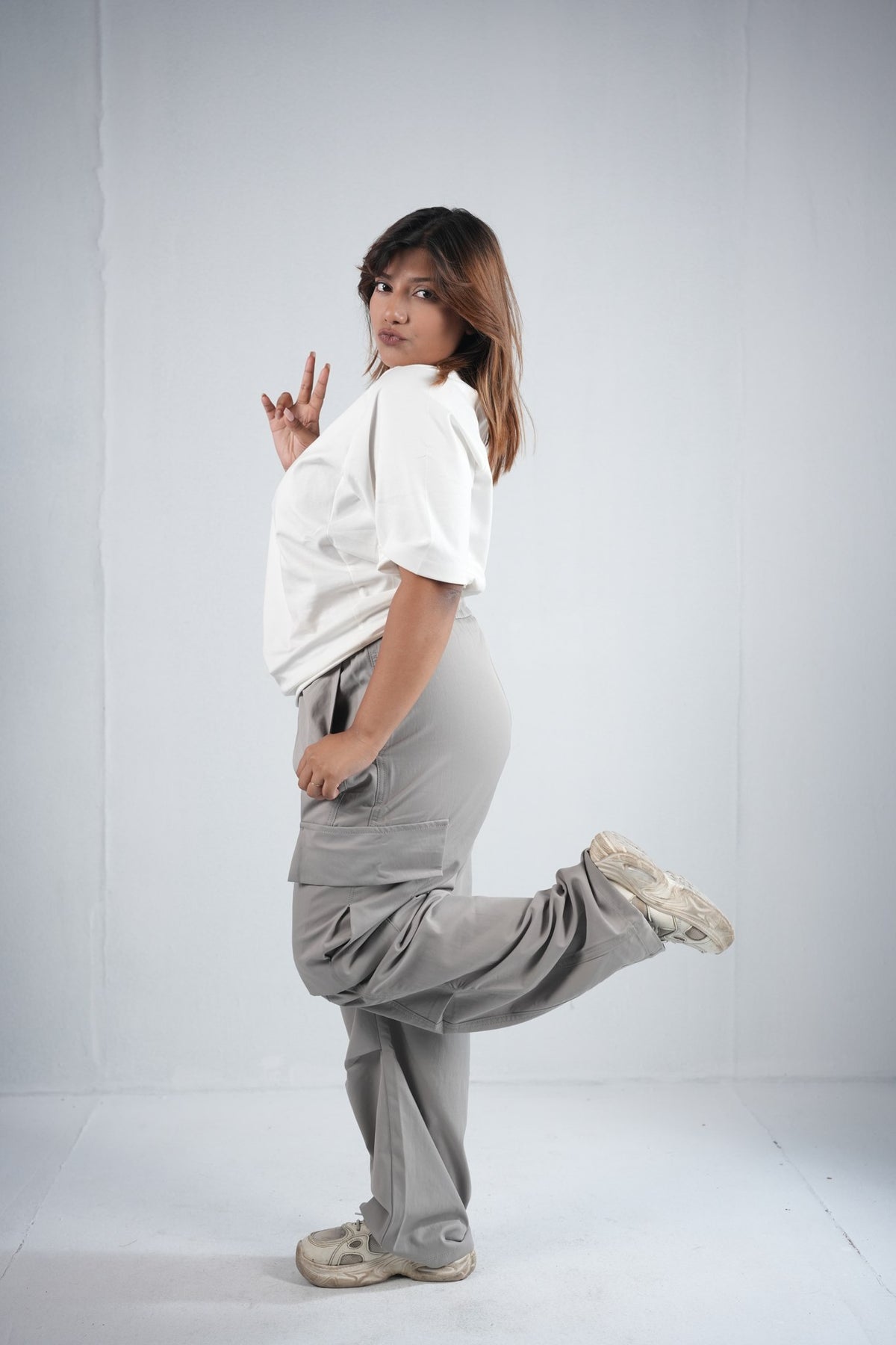 Premium Cargo Pant For Men & Women – Stone Grey, lifestyle shot on model | BYSPORTS