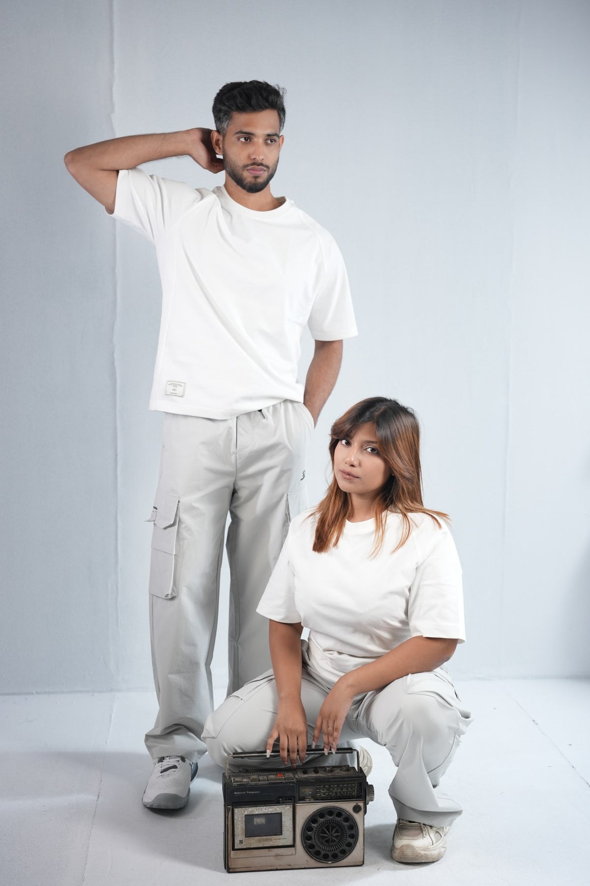 Premium Multi-Pocket Cargo Pant For Men & Women – Light Grey, worn by male and female models | BYSPORTS