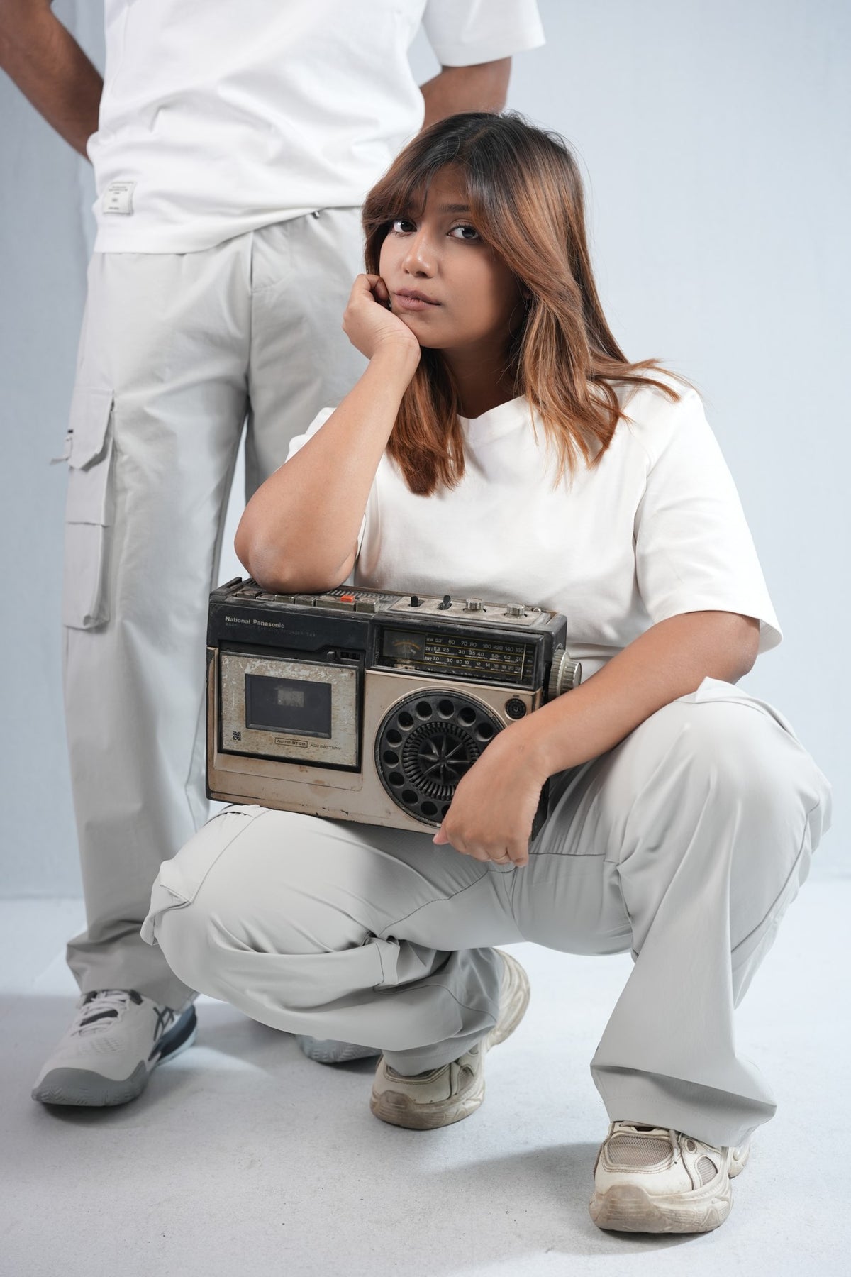 Premium Multi-Pocket Cargo Pant For Men & Women – Light Grey, worn by male and female models 2 | BYSPORTS