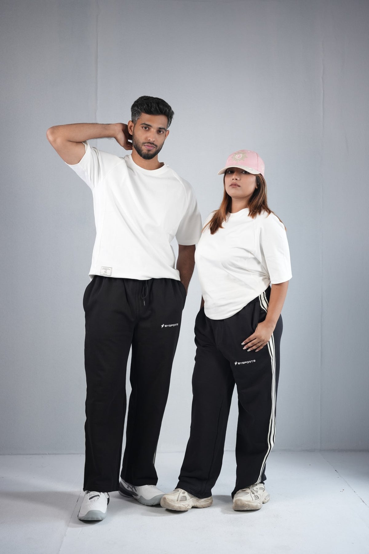 BYSPORTS Premium Side-Stripe Trouser For Men & Women – Black, worn by male and female models | BYSPORTS