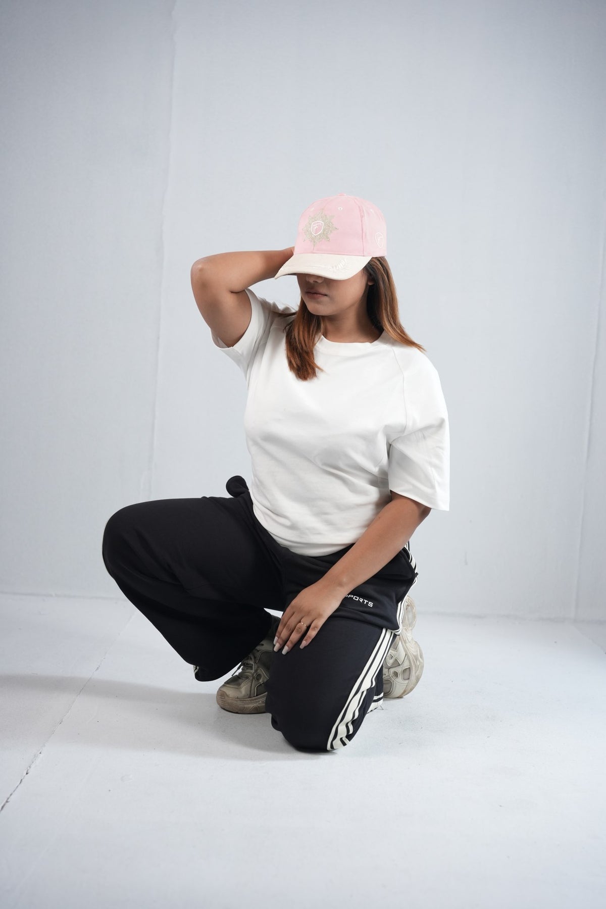BYSPORTS Premium Side-Stripe Trouser For Men & Women – Black, lifestyle shot on model | BYSPORTS