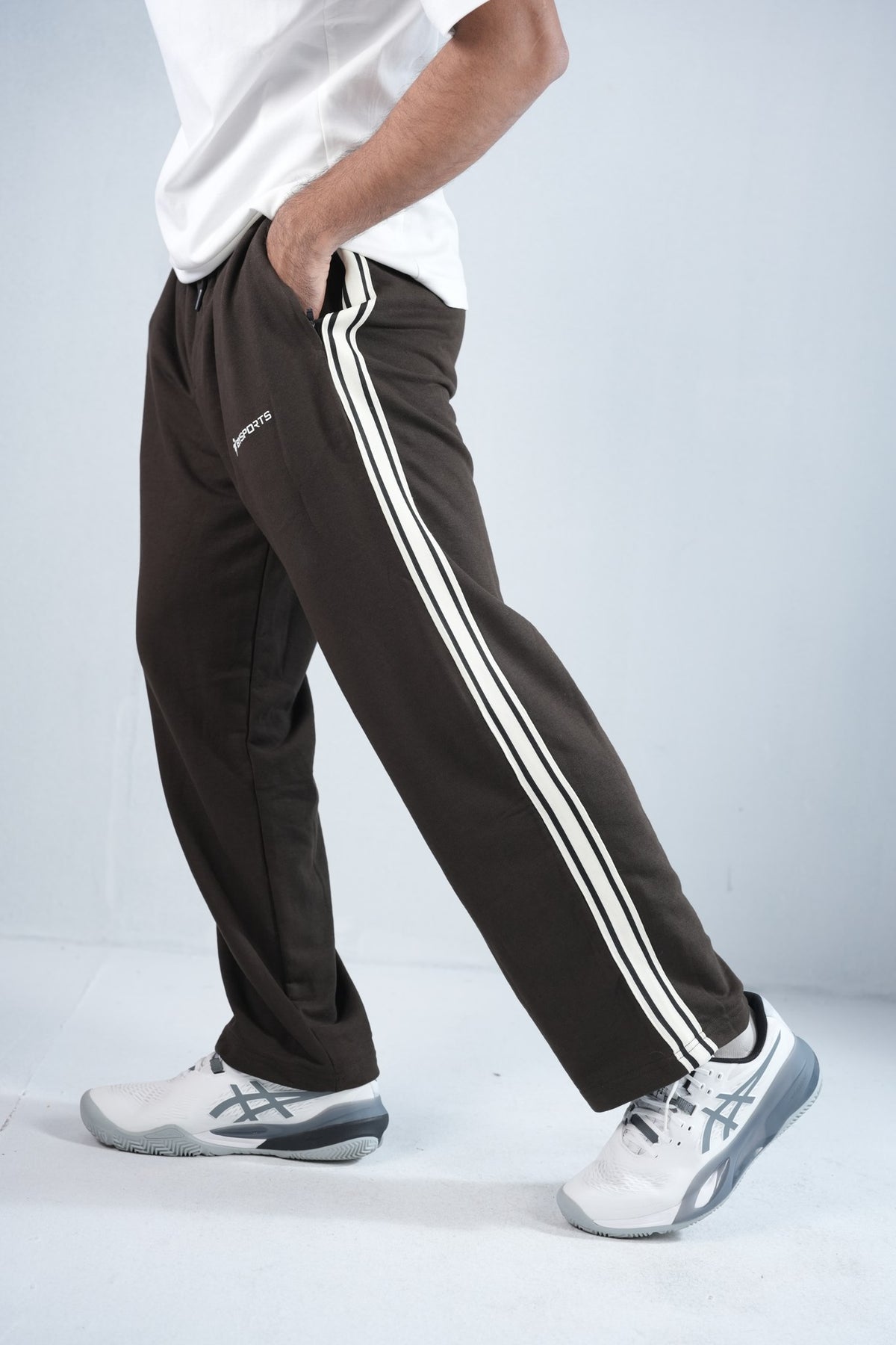 BYSPORTS Premium Side-Stripe Trouser For Men & Women – Brown, side view on model 2 | BYSPORTS