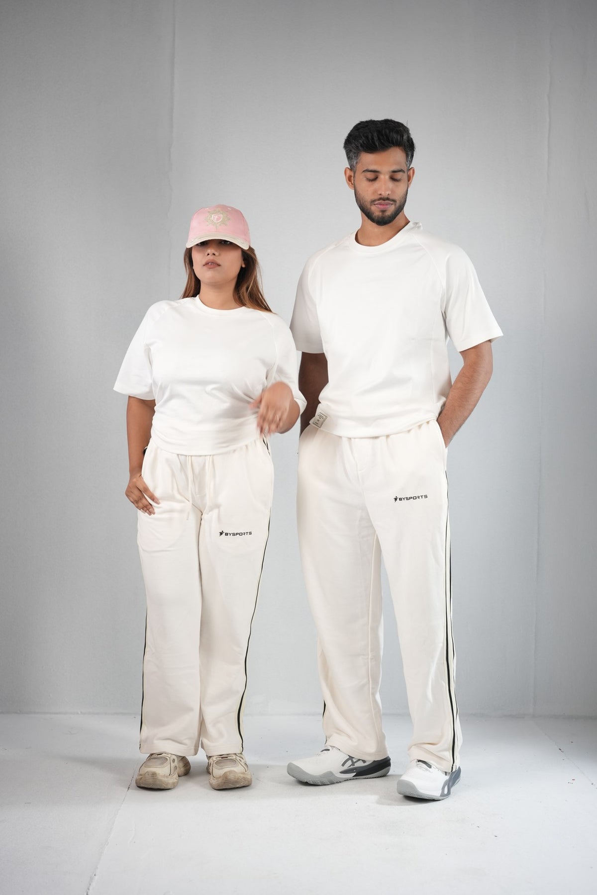BYSPORTS Premium Side-Stripe Trouser For Men & Women – Cream, worn by male and female models 5 | BYSPORTS