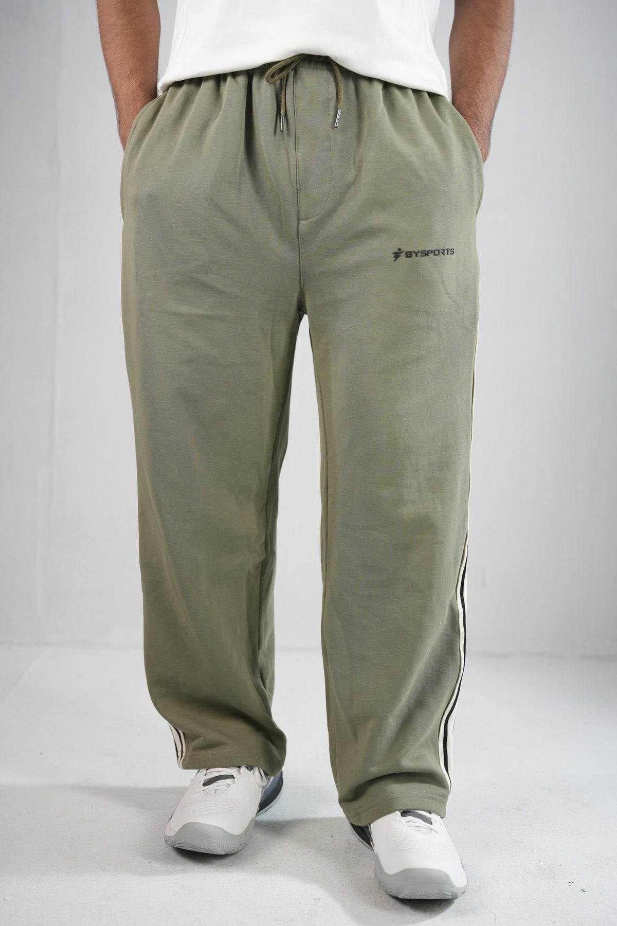 BYSPORTS Premium Side-Stripe Trouser For Men & Women – Olive, worn by model 3 | BYSPORTS