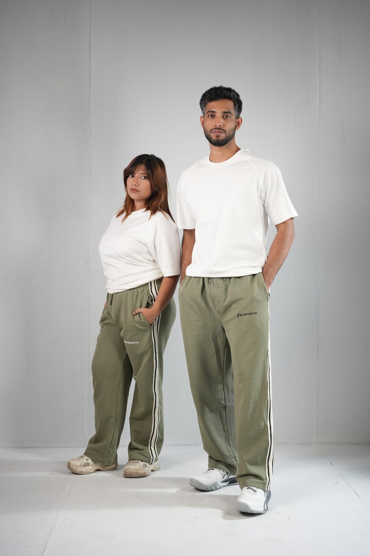 BYSPORTS Premium Side-Stripe Trouser For Men & Women – Olive, worn by male and female models | BYSPORTS